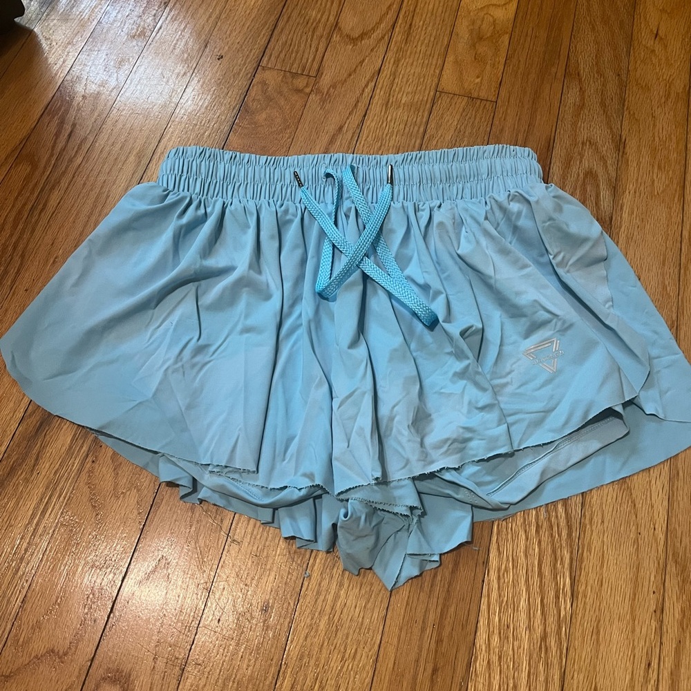 Blue athletic shorts, butterfly shorts